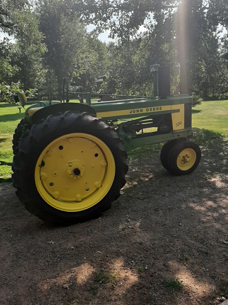 Side profile of the 520 showing rear tires and rims